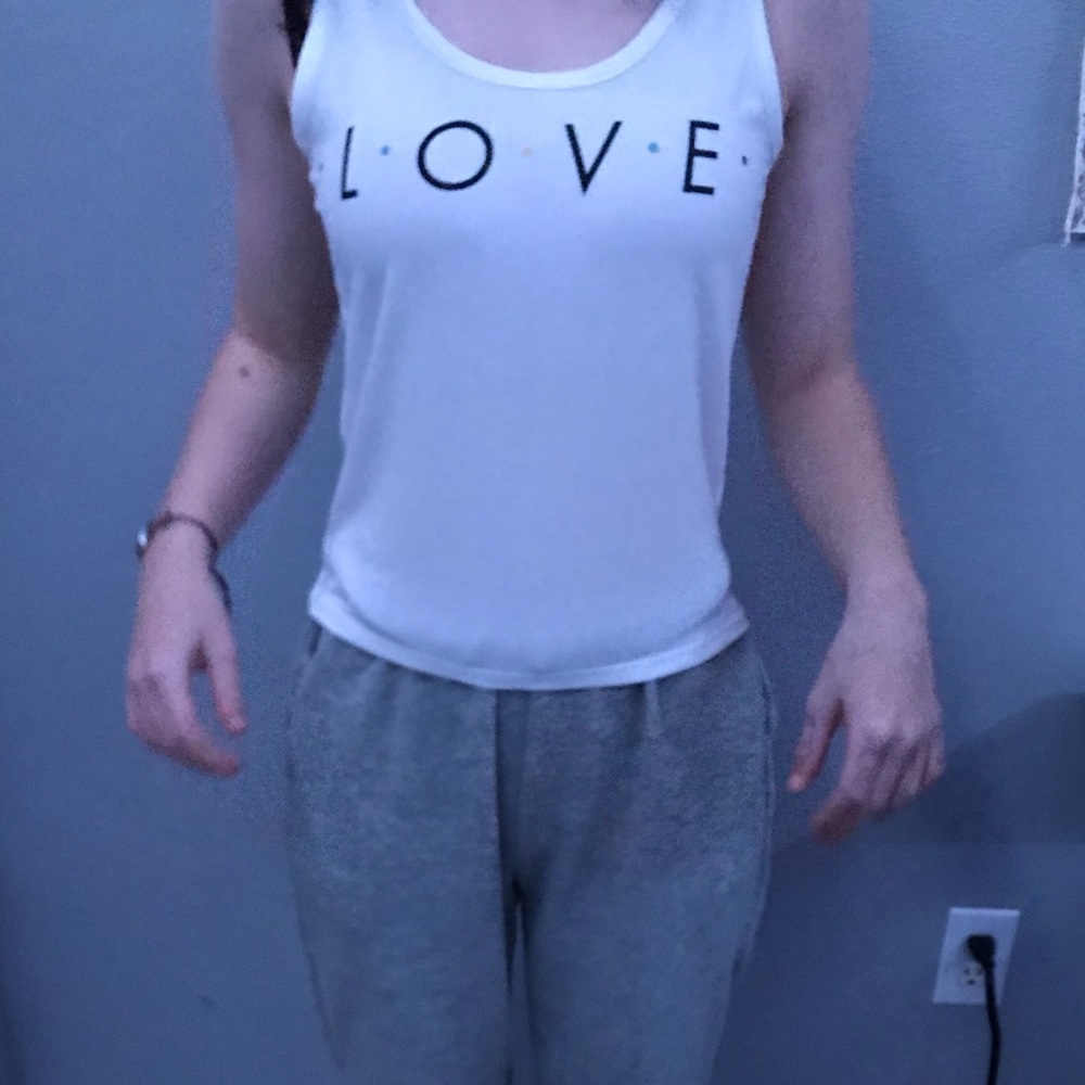 White tank top with wording “love”